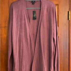 Women's Purple Sweater,  same color on both sides, but picture looks different.